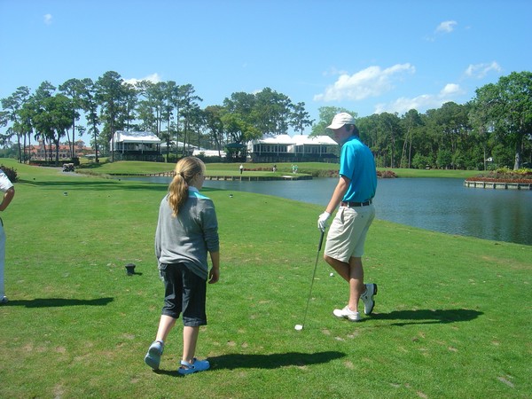 Lewis Jackson with sister Annabel at the 17th tee at TPC Sawgrass, Florida